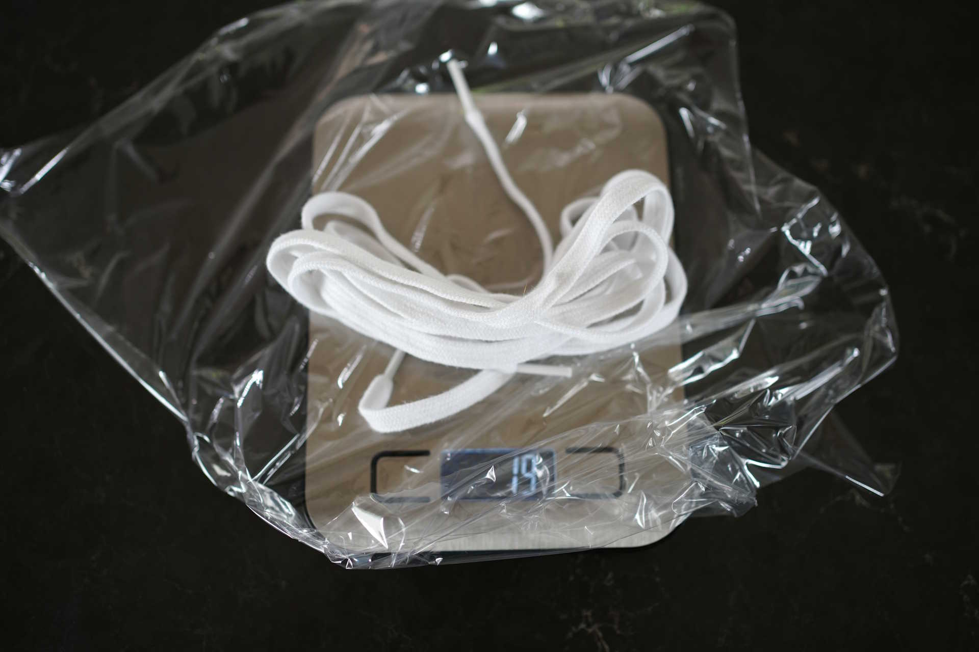pair of white laces on a digital scale